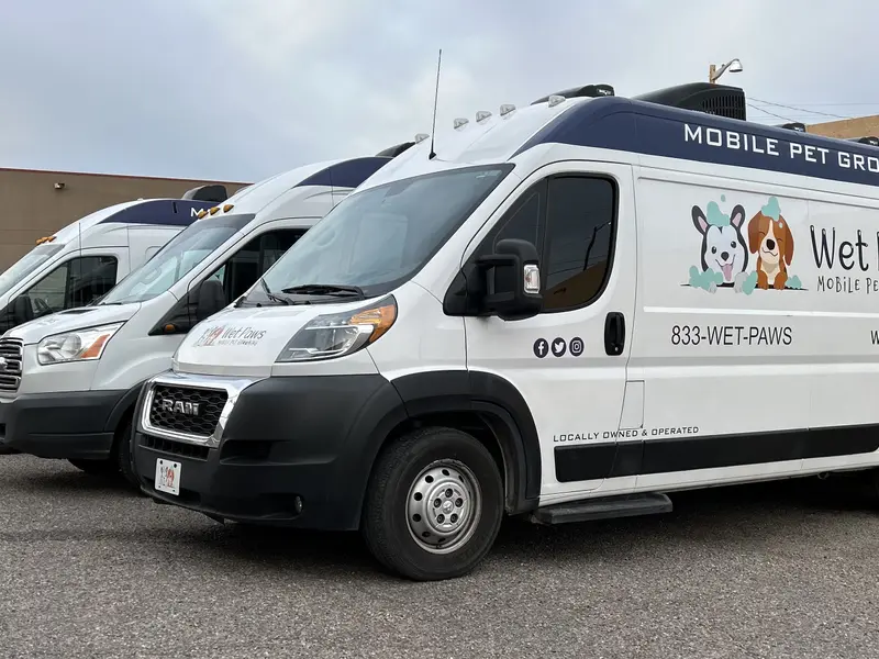 Fleet of mobile pet grooming vans