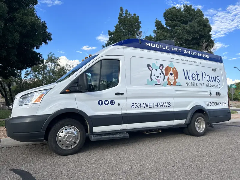 Mobile pet grooming van on the road